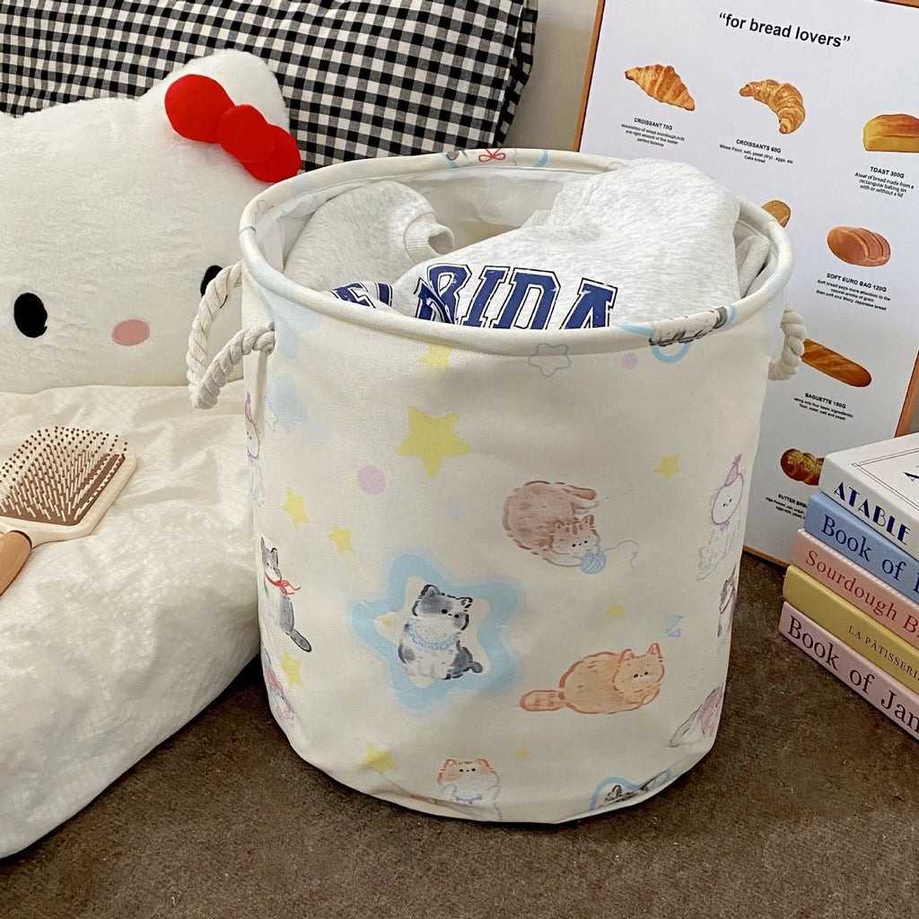 Foldable cotton laundry basket in Baby Bear and Rabbit design collapsed and unfolded showing storage capacity