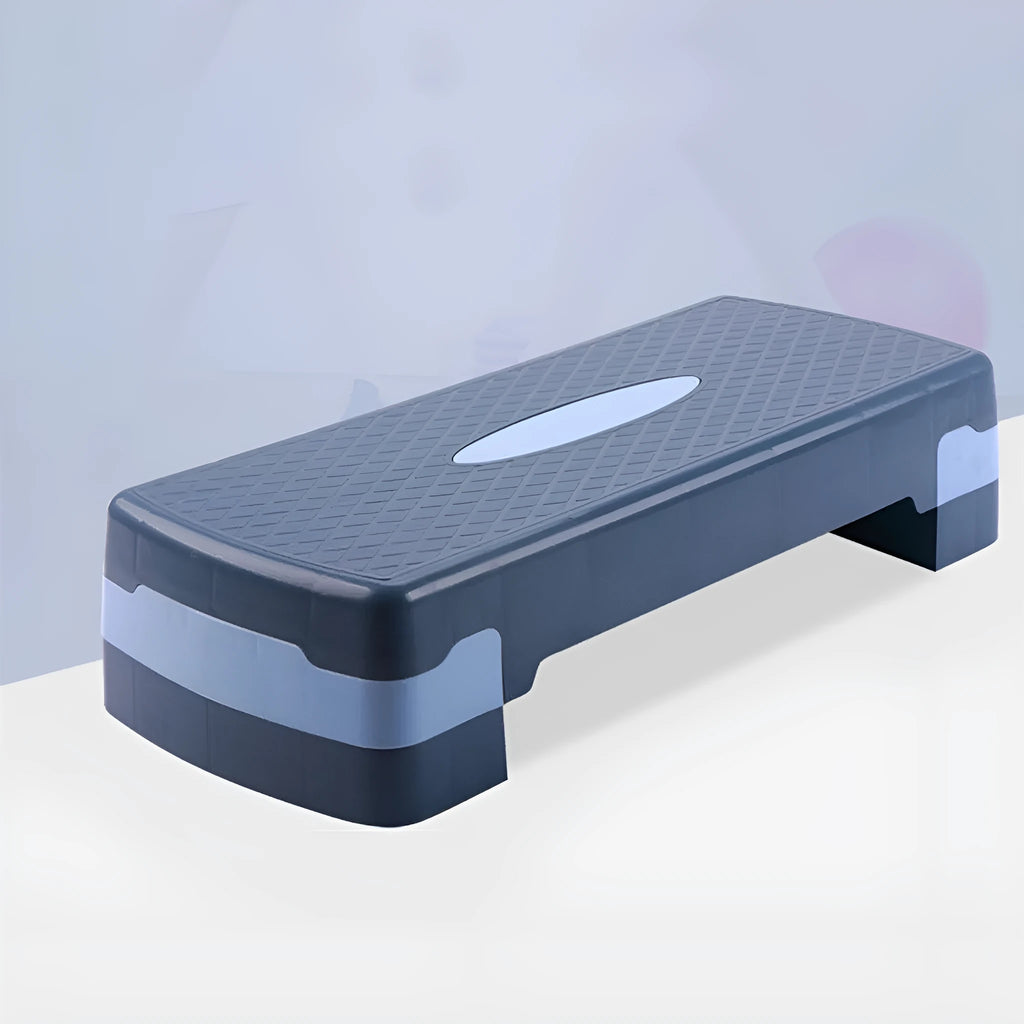 Grey Fit Step aerobic fitness platform on a floor, showing its 68cm length and 15cm height.