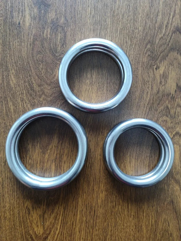 Silver electroplated carbon steel Wing Chun training ring for forearm conditioning.