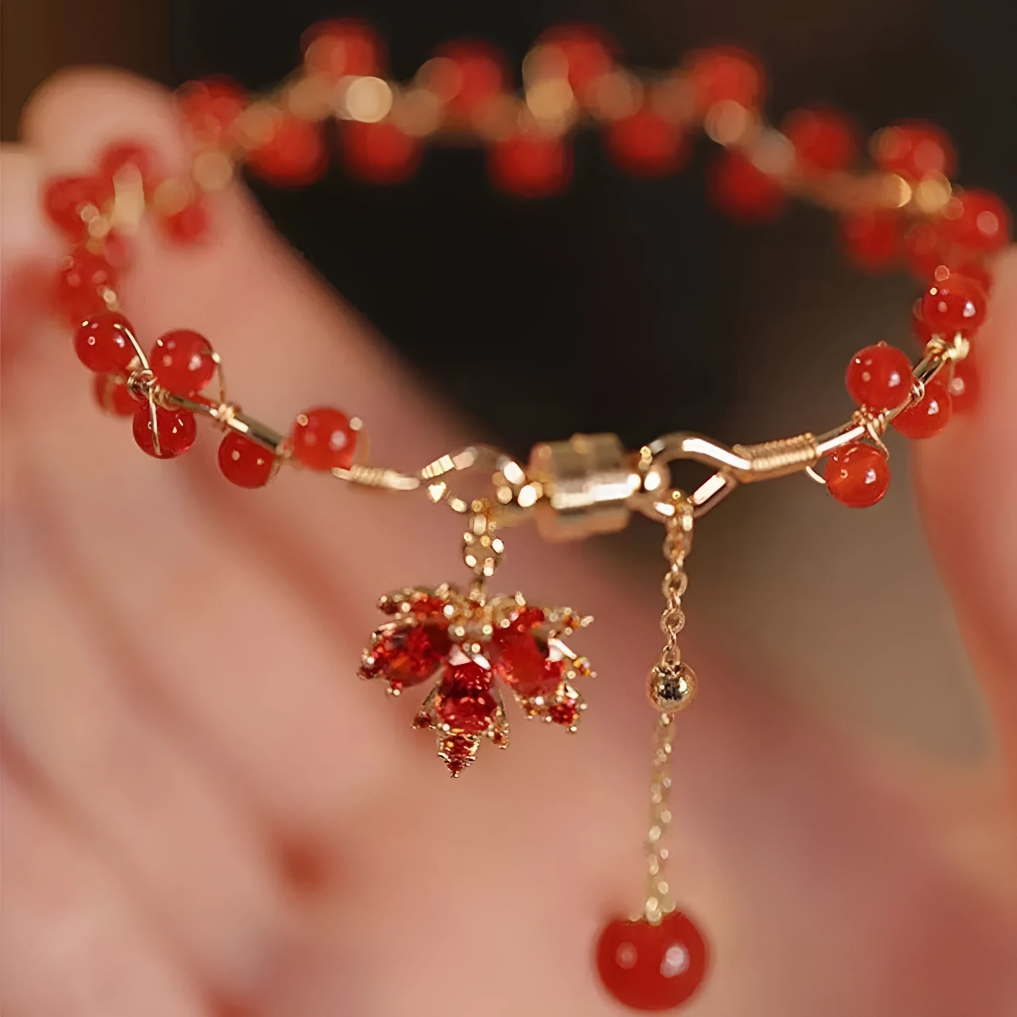 Red ginkgo leaf electroplated magnetic bracelet with a maple leaf design in New Chinese style.