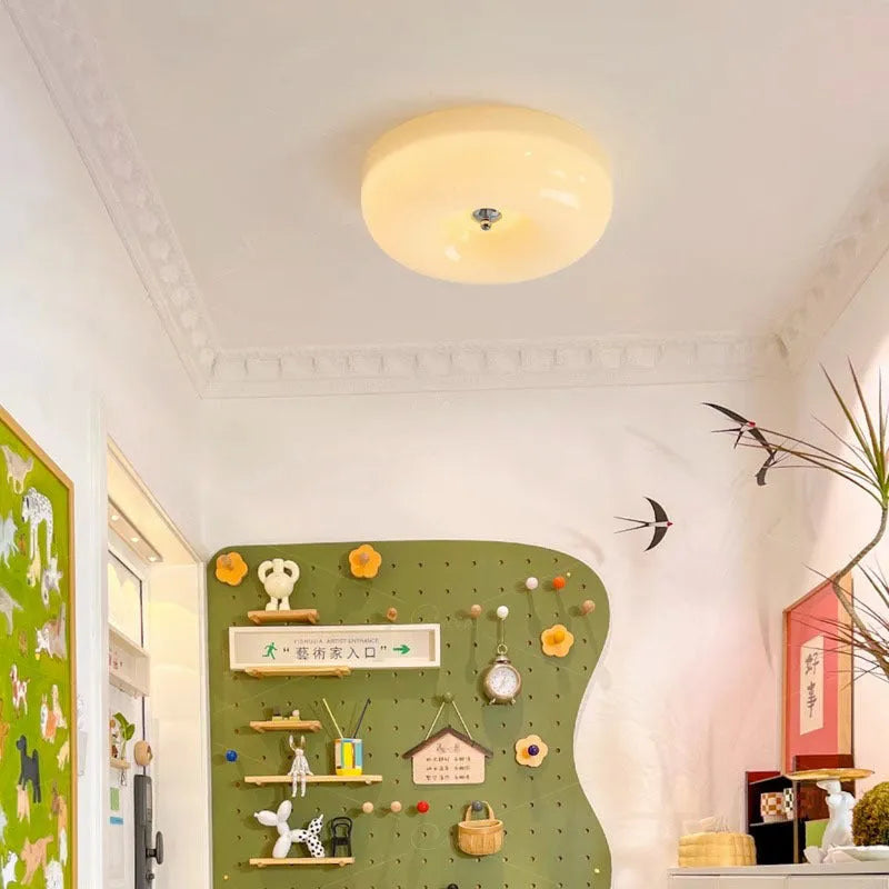 Cream-coloured American vintage style bedroom ceiling light with three-colour settings.