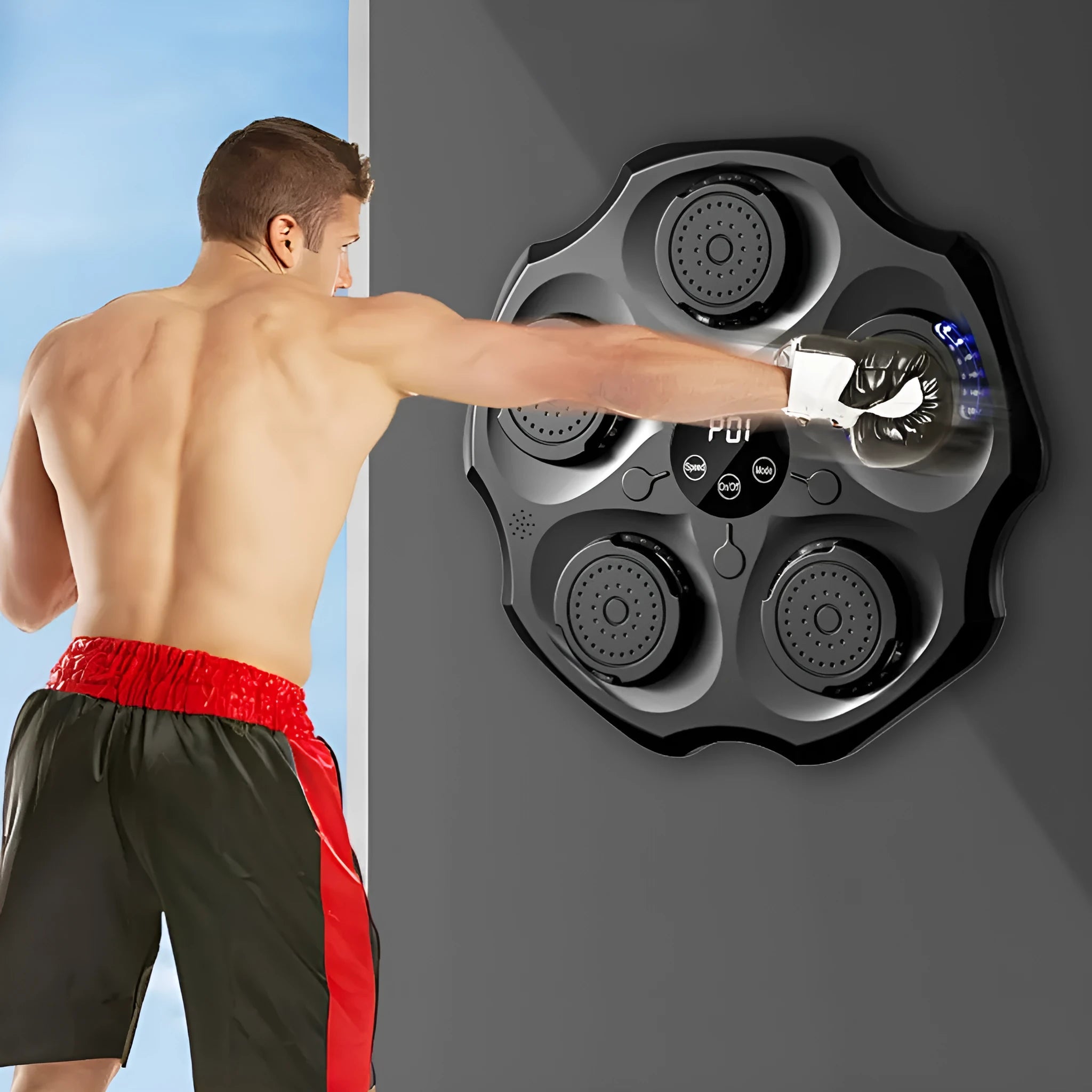 Black hanging PU boxing wall target with Bluetooth music recognition and included glove for home fitness.