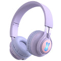 Wireless children's headphones with RGB LED lights in bunny pink colour showing illuminated ear cups