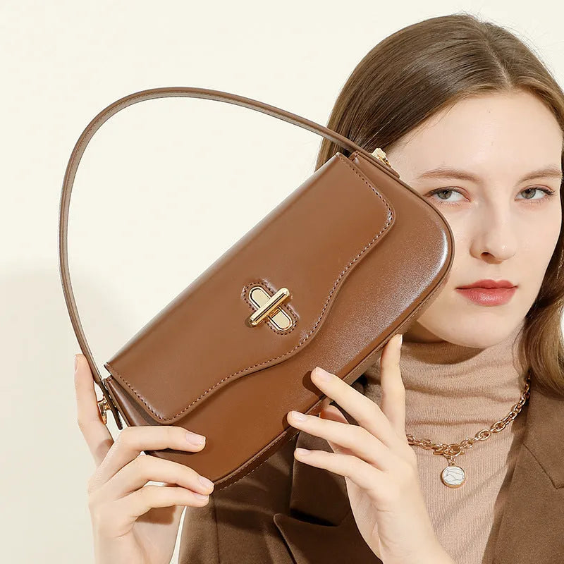26cm wide genuine leather women's handbag in horizontal square shape with clamshell opening and double shoulder straps