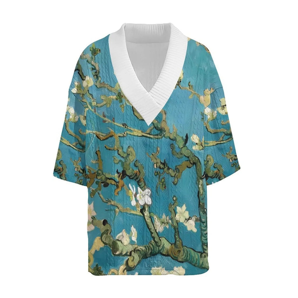 Peacock blue men's knitted casual suit with matching T-shirt top and shorts laid flat.