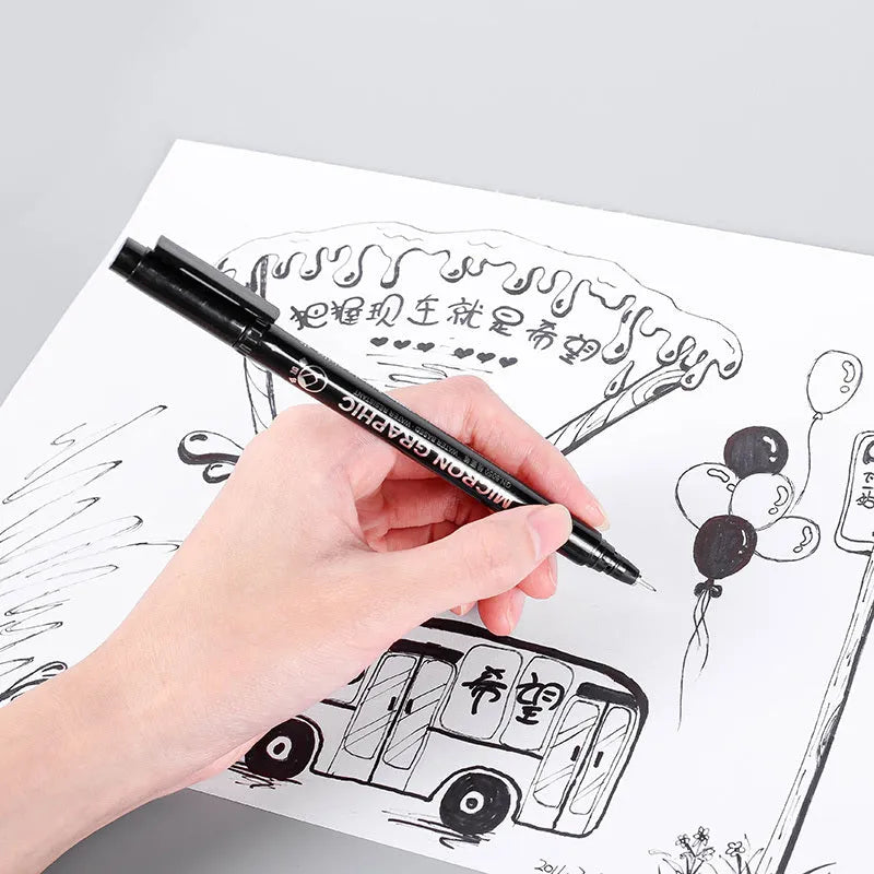 Set of 12 black comic hand-painted pens with various nib sizes in a storage bag organiser
