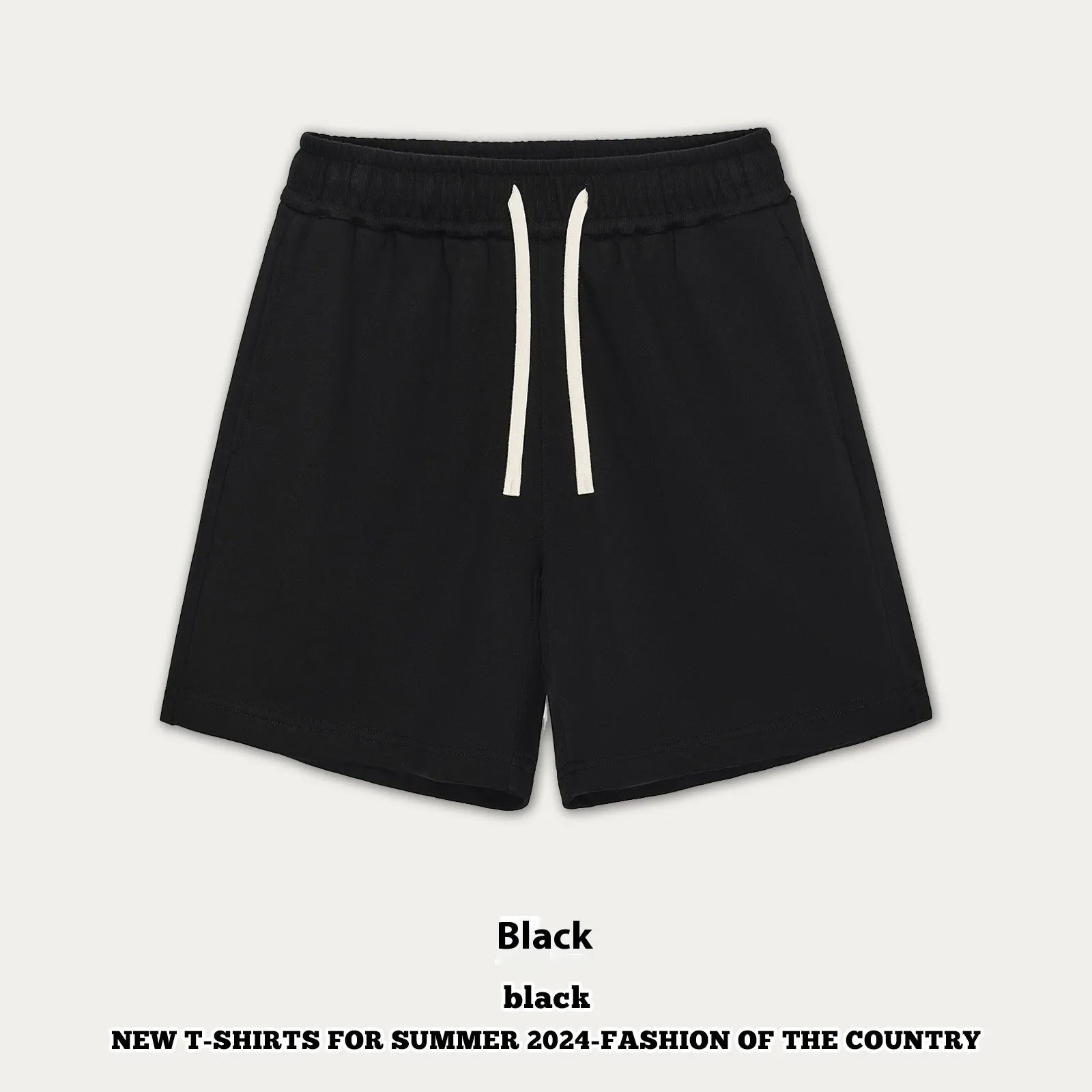 Child wearing loose fit cotton denim shorts in charcoal grey, showing casual summer style