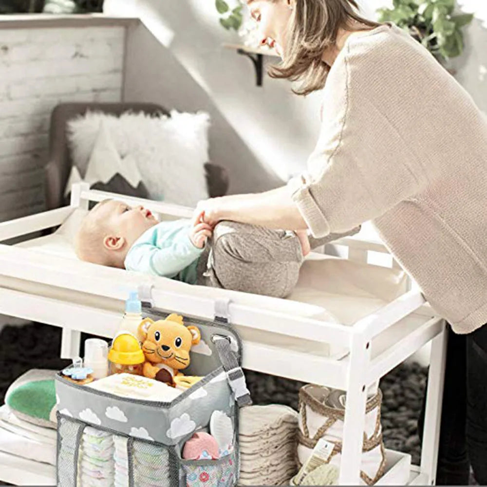 Grey portable baby crib organizer hanging bag with two hooks and compartments
