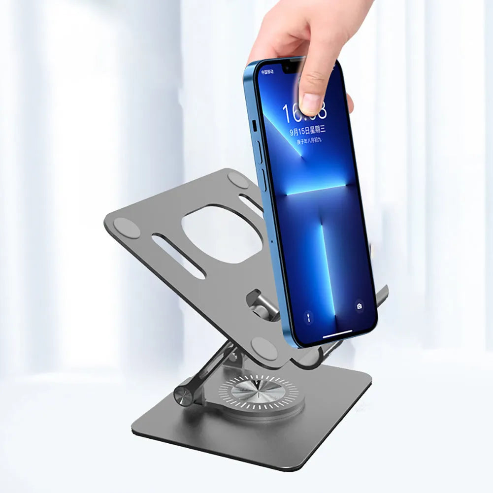 Rotating flat stand in silver colour showing adjustable height mechanism for tablets