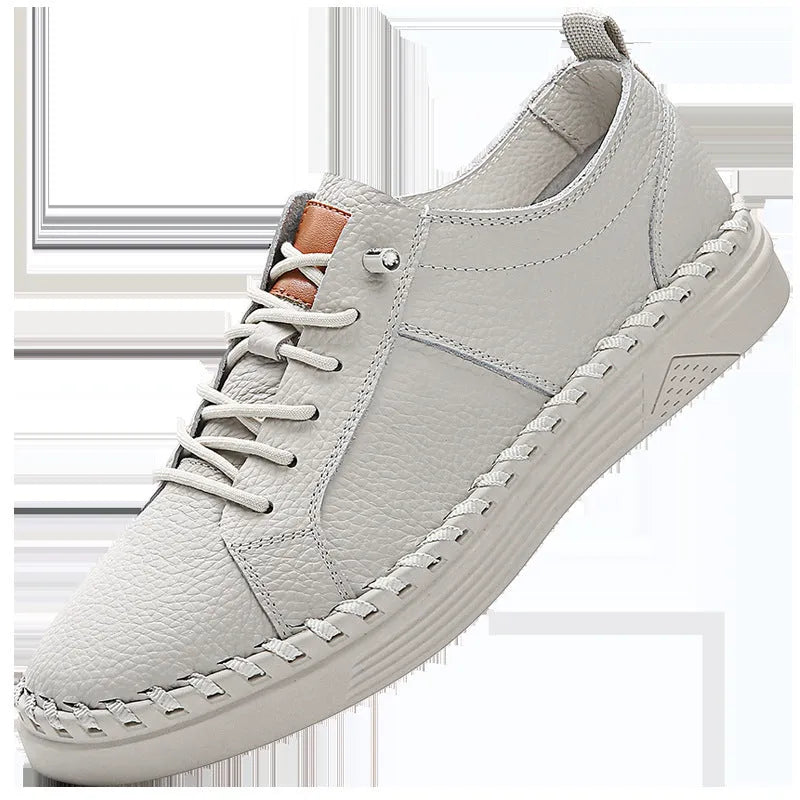 Men's beige and black cowhide leather sneakers with round toe and mesh lining.