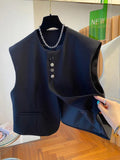 Loose-fitting waistcoat bandage dress in polyester with pockets, shown in beige and black colour options