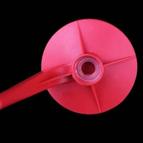Red plastic Magic Tap manual soda bottle dispenser for 2-litre bottles.