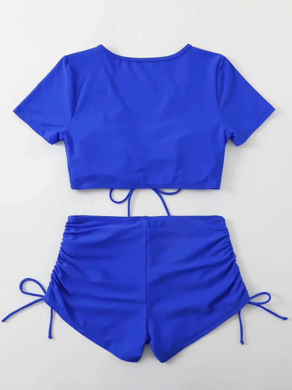 Lady's lace-up bow bikini swimsuit set in black, with separate top and shorts.