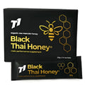 Jar of T1 Black Thai Honey with dark black colour.