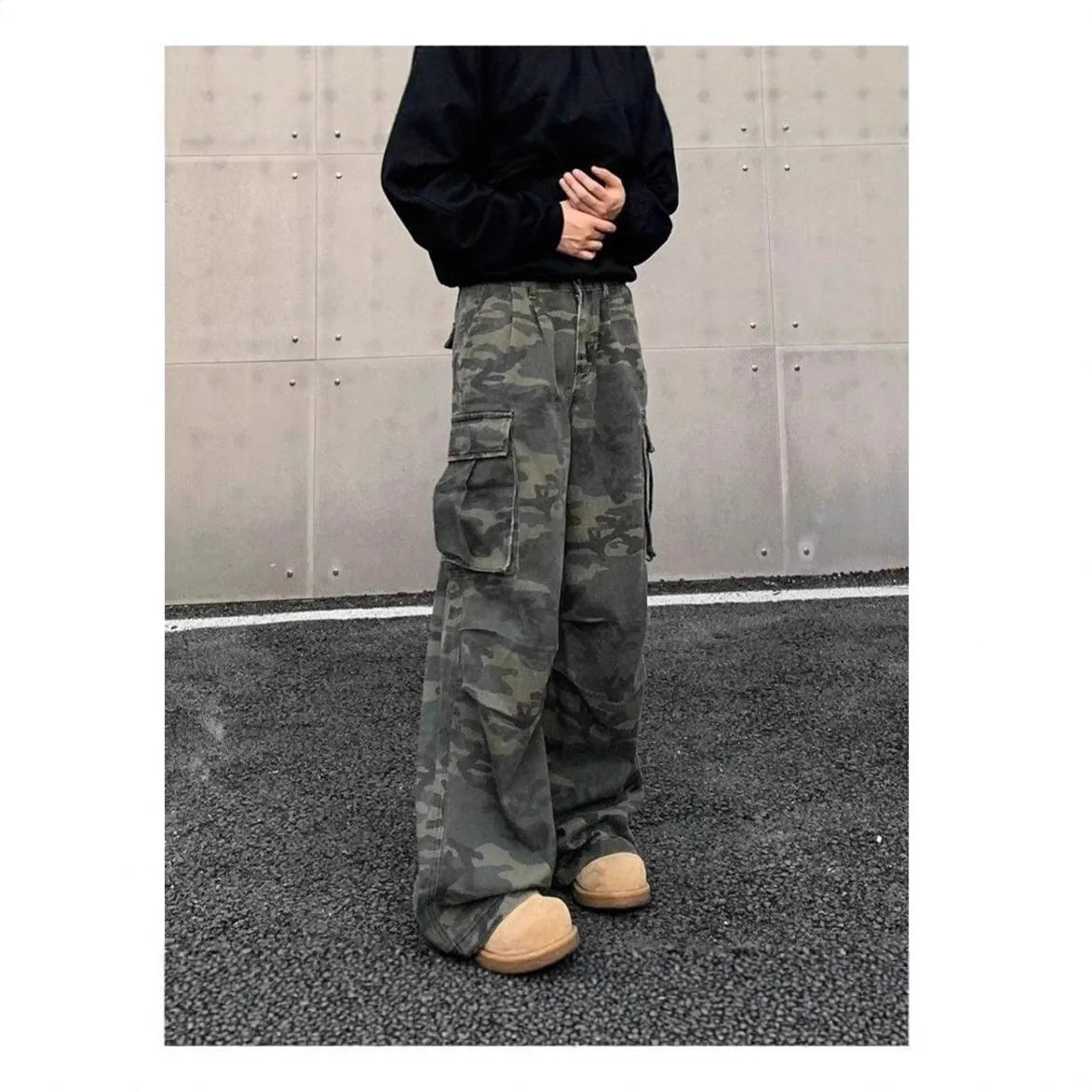 Korean style mid waist camouflage cargo trousers with multiple pockets on a mannequin.
