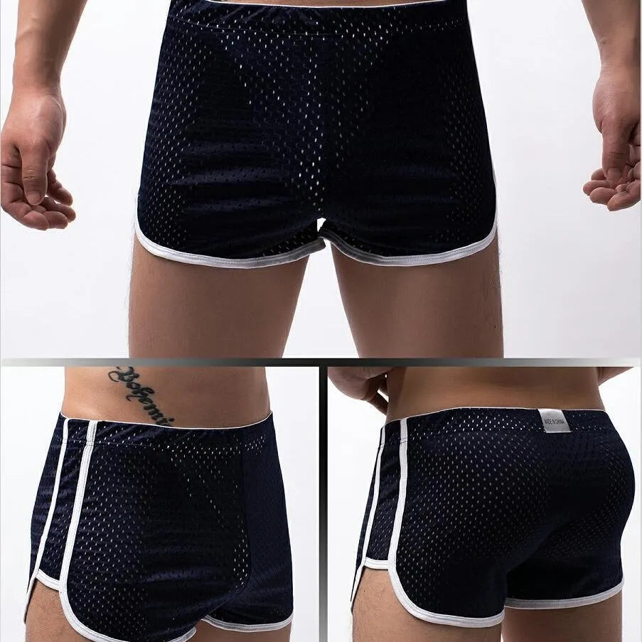Men's knitted cotton boxer shorts in black, shown flat.