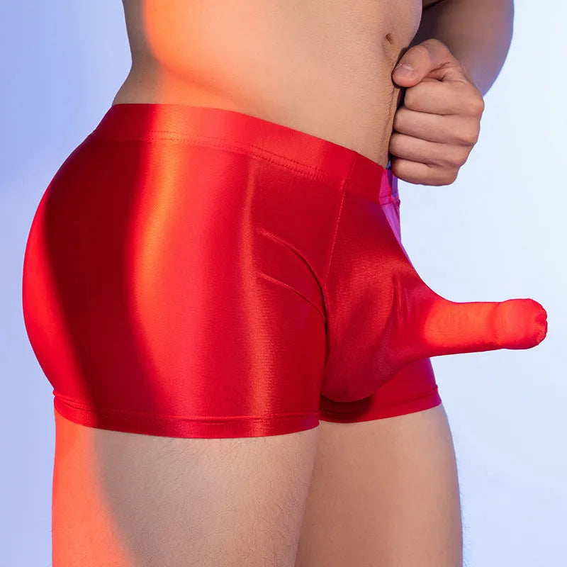 Red men's boxer shorts with elephant nose design, seamless construction, and mid waist fit