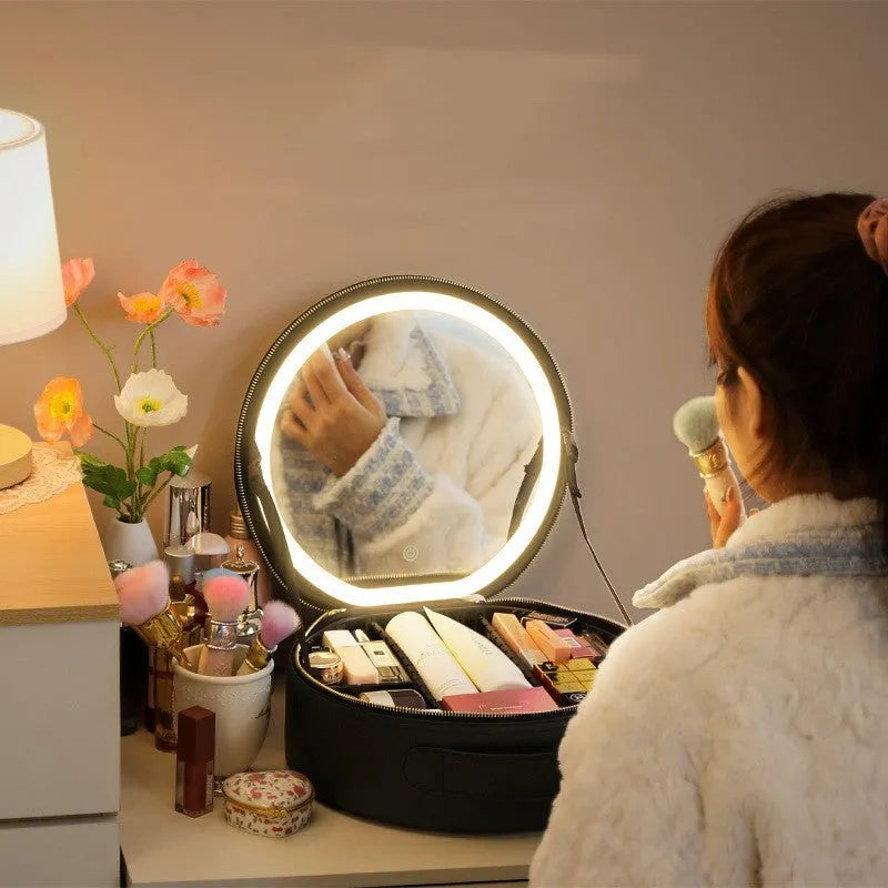 Round cherry blossom pink PU leather makeup bag with a lit LED mirror inside, showing internal partitions.