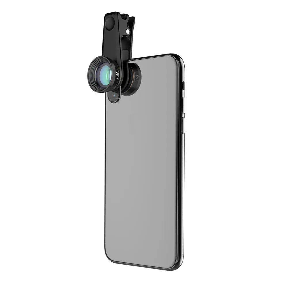 Black aluminium 6-in-1 smartphone camera lens kit with fisheye, macro, telephoto and filter lenses on a universal clip.