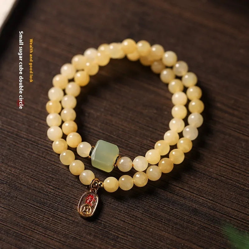 Hand-woven women's topaz bracelet with 6mm lucky barrel beads and square sugar jade beads in yellow jade colour