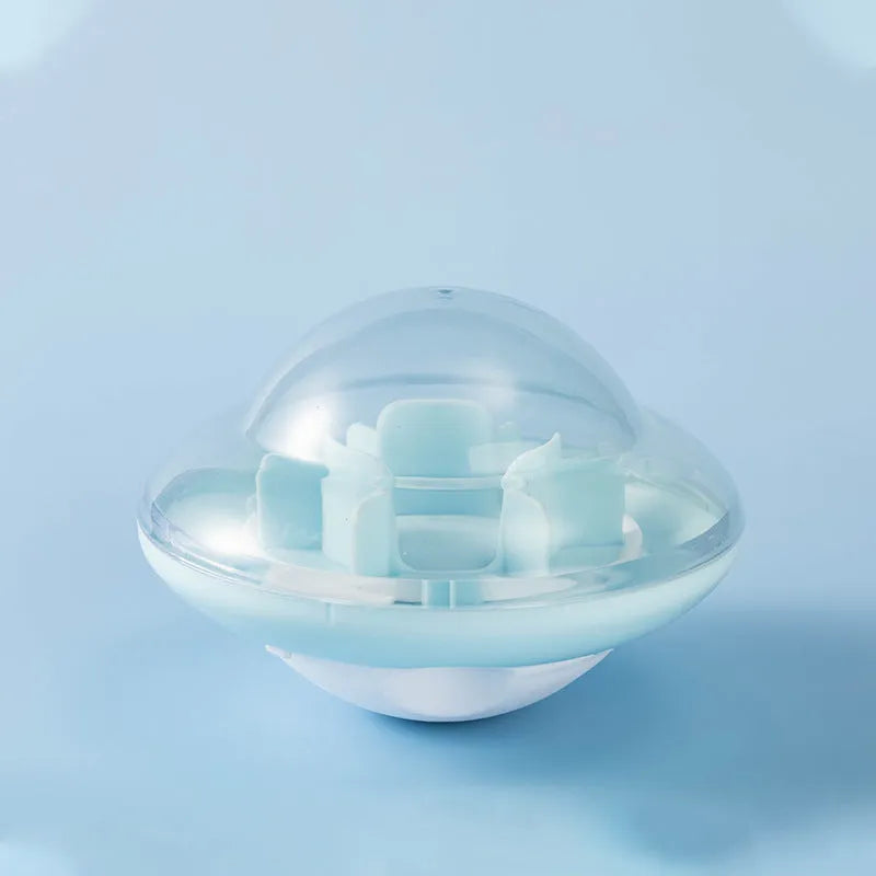 Blue pet tumbler ball toy with clear visual cabin and labyrinth column on floor