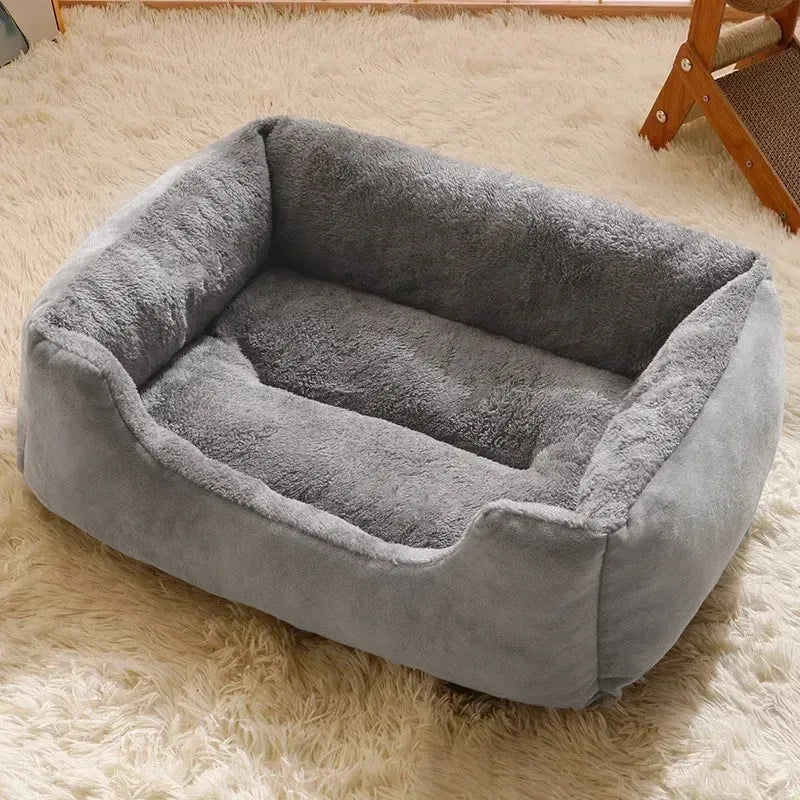 Soft plush cat bed cushion shown in grey, available in five sizes from small to extra extra large.