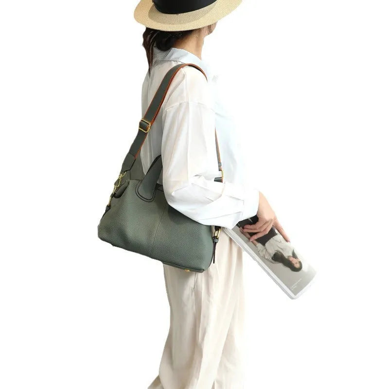 Women's genuine leather cross-body bag in horizontal square shape with internal compartments