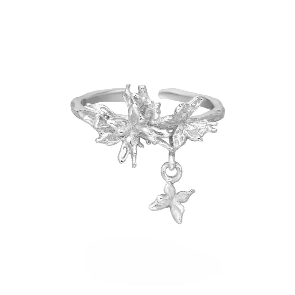 Silver butterfly ring with adjustable opening in white gold or gold finish.