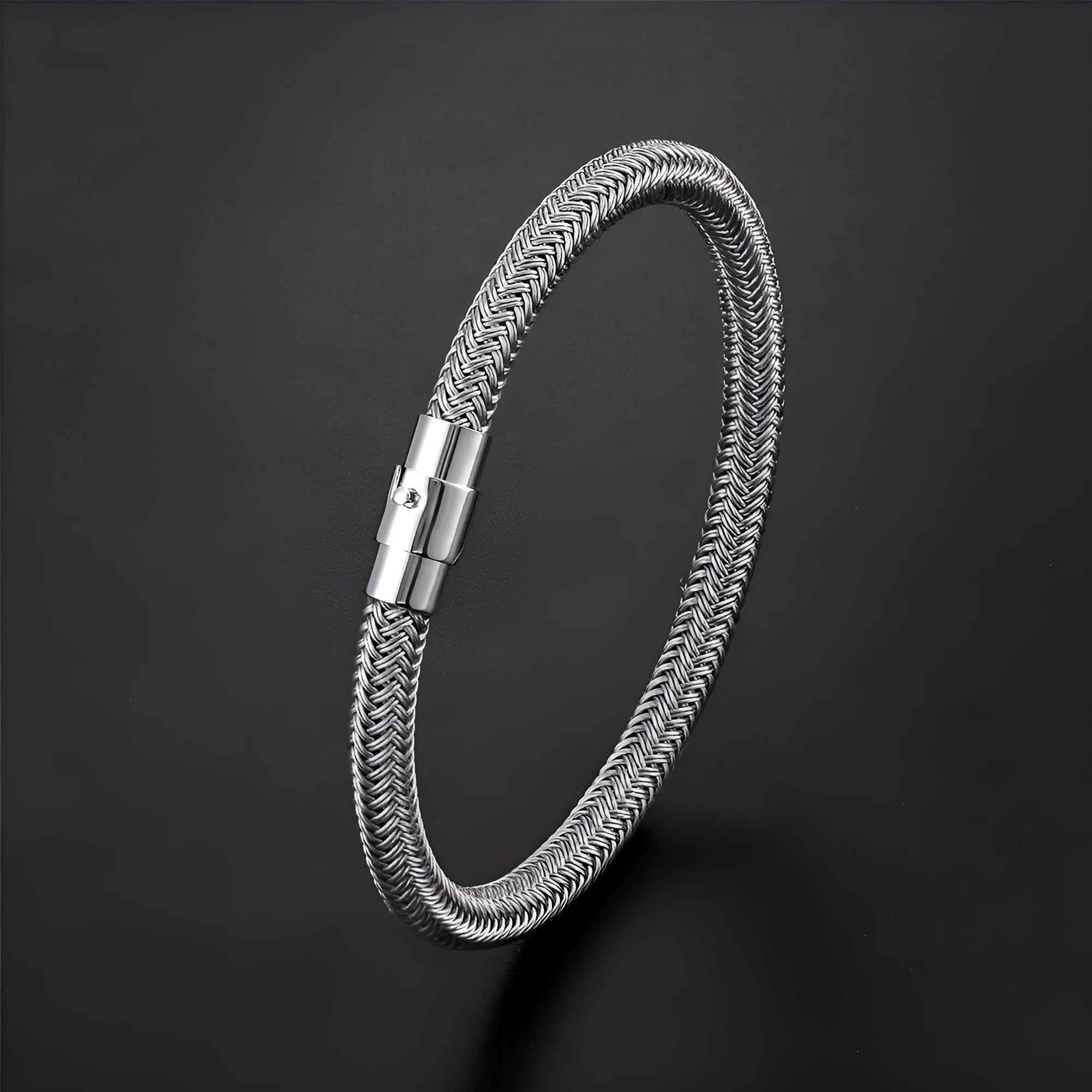 Geometric titanium steel wire bracelet with a magnetic clasp, shown in a silver colour.