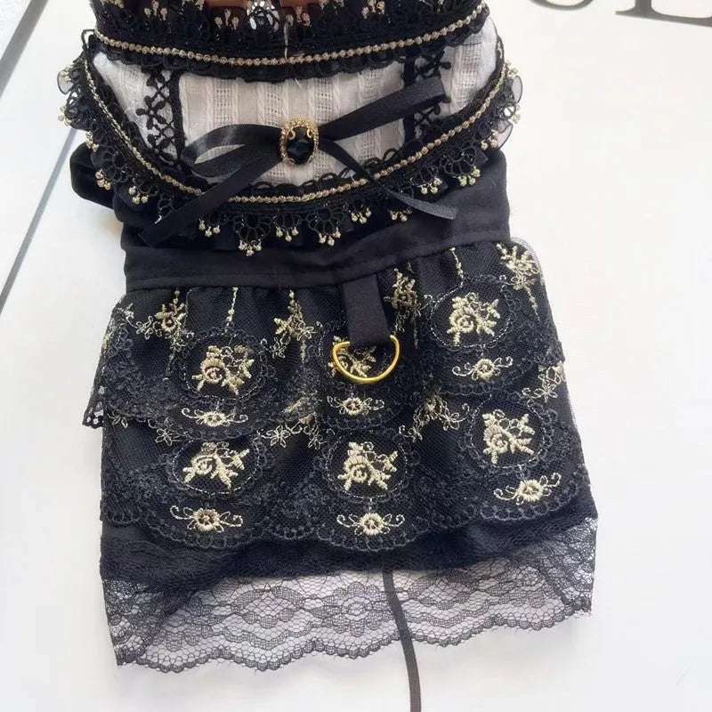 Golden Gothic princess-style skirt pet clothing for a small dog or cat on a mannequin.