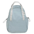 Solid colour nylon backpack with curved shoulder straps and a lock closure.