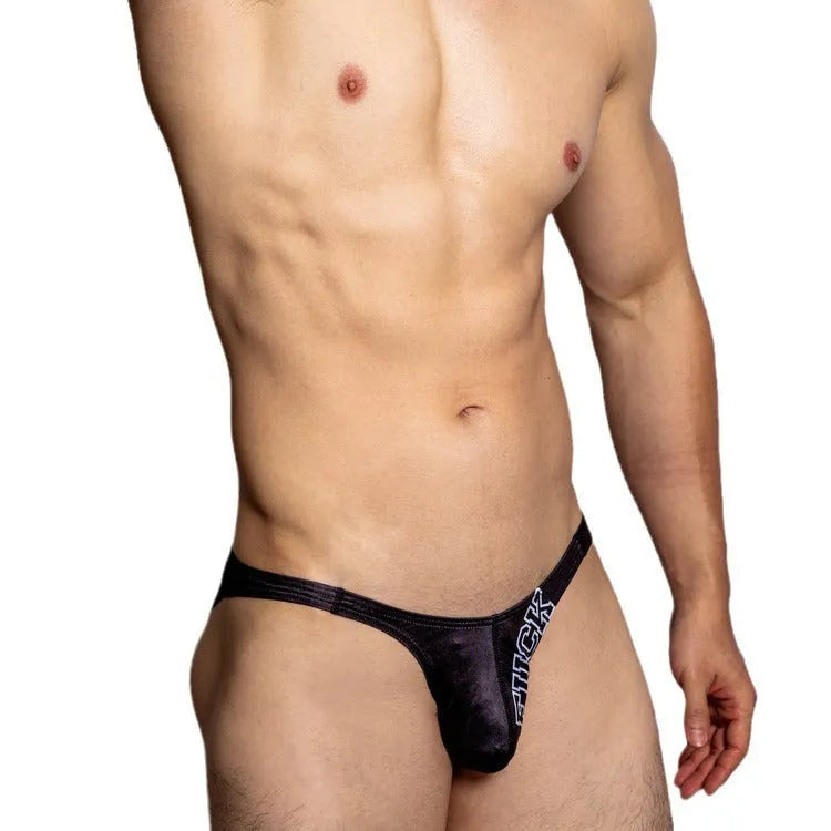 Low-waist triangle shorts in briefs style made from white, black, or orange polyester plain weave fabric.