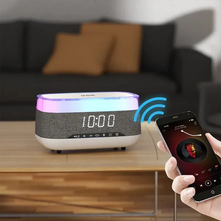White multifunctional alarm clock with Bluetooth speaker, wireless charging pad, and night light display