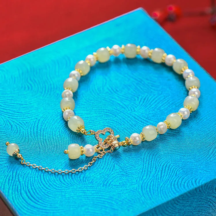 Natural Hetian Jade women's bracelet with pearl pendant and gold electroplated Chinese style design