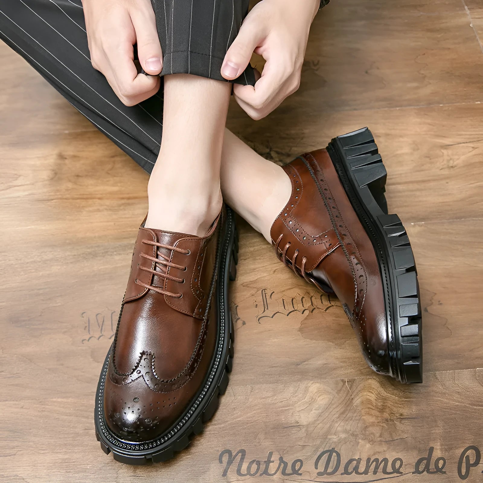 Men's black and brown round toe brogue shoes made from artificial PU leather for business wear.