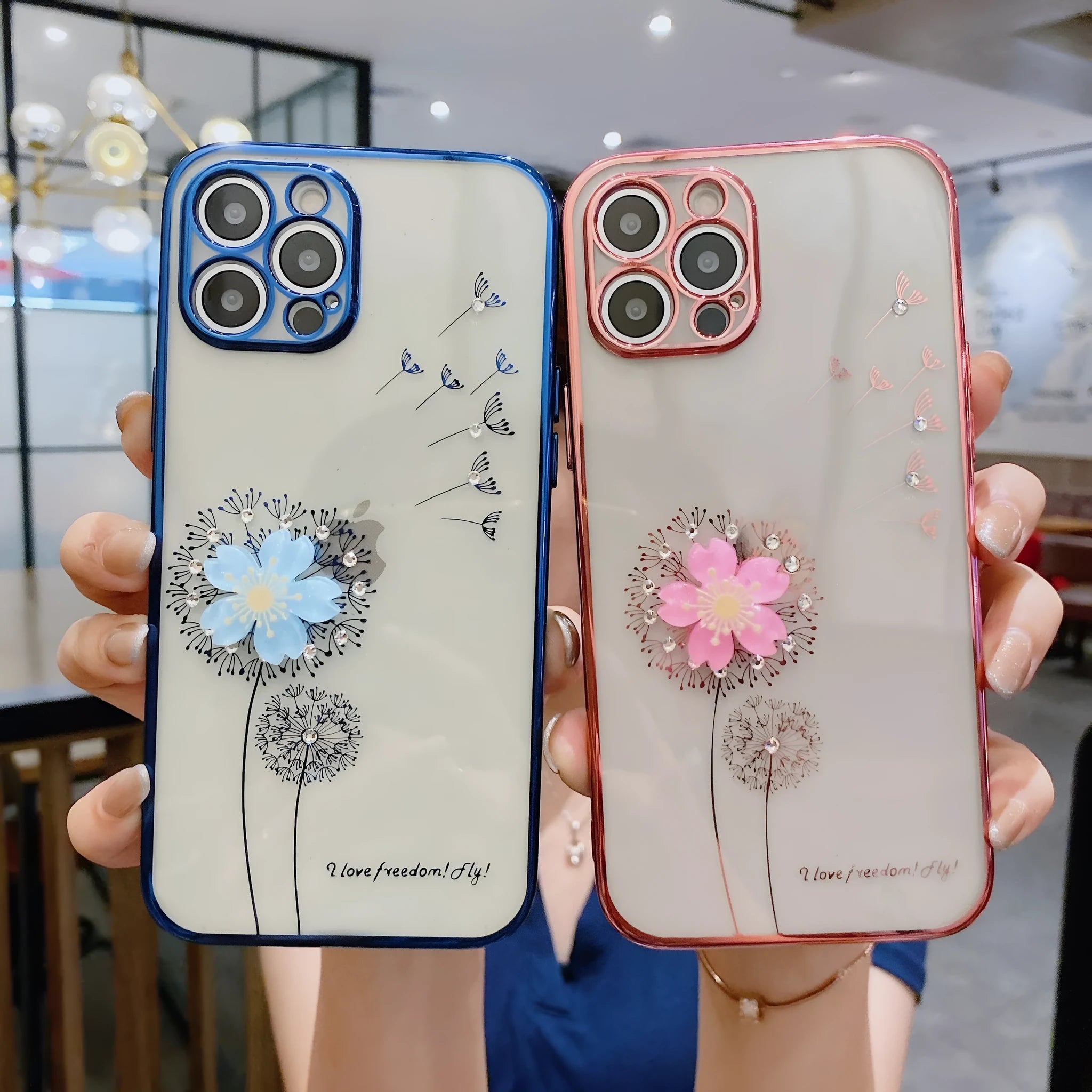 Green silicone iPhone case with a built-in screen protector and a white 3D flower spin stand on the back.
