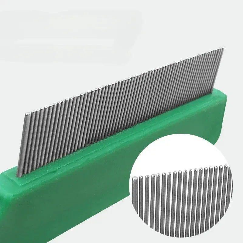 Green plastic-handled flea comb with stainless steel pins for dogs and cats.