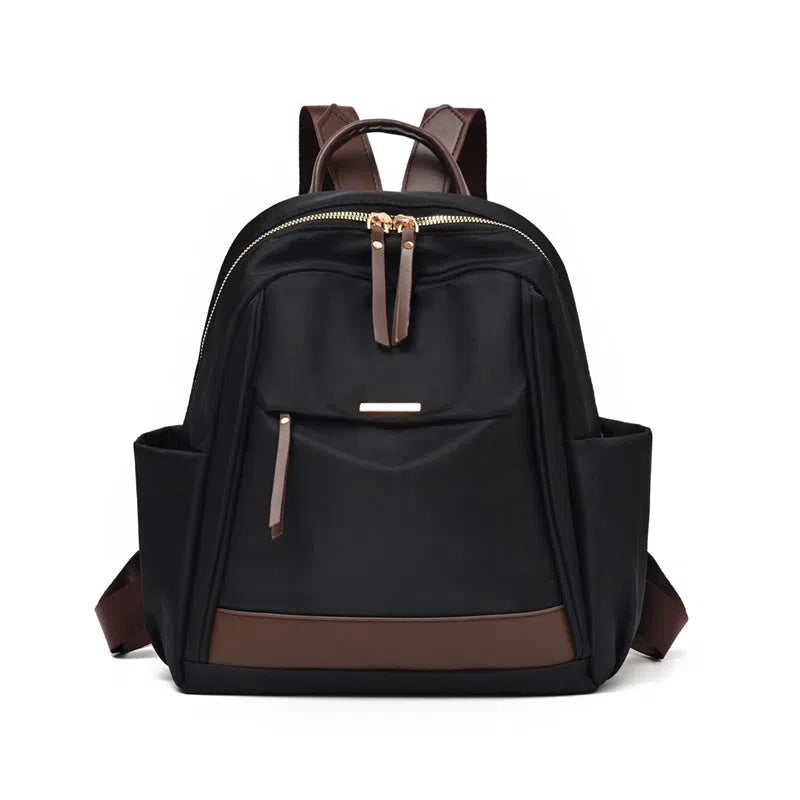 Women's large-capacity nylon travel backpack in black with internal patch pocket