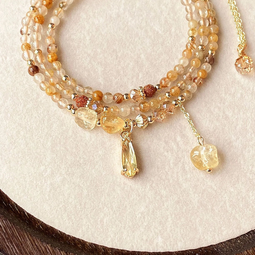 Women's multi-layer bracelet with caramel citrine stones and gold electroplated three-circle design