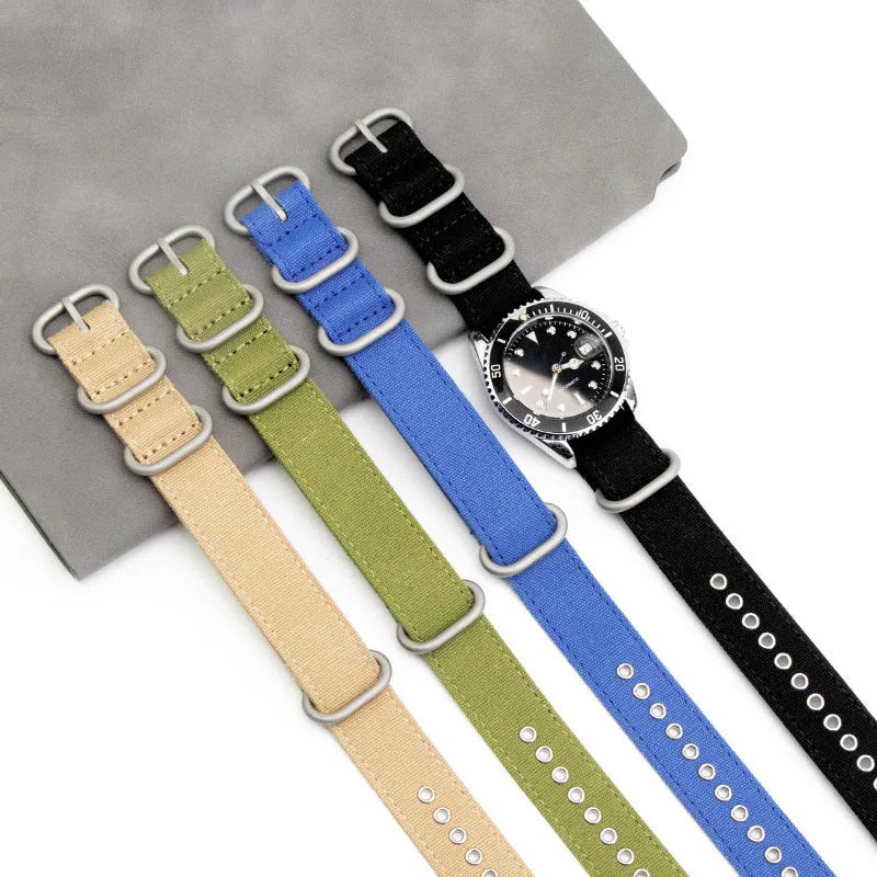 Canvas nylon thickened watch band in army green with silver buckle on a wrist