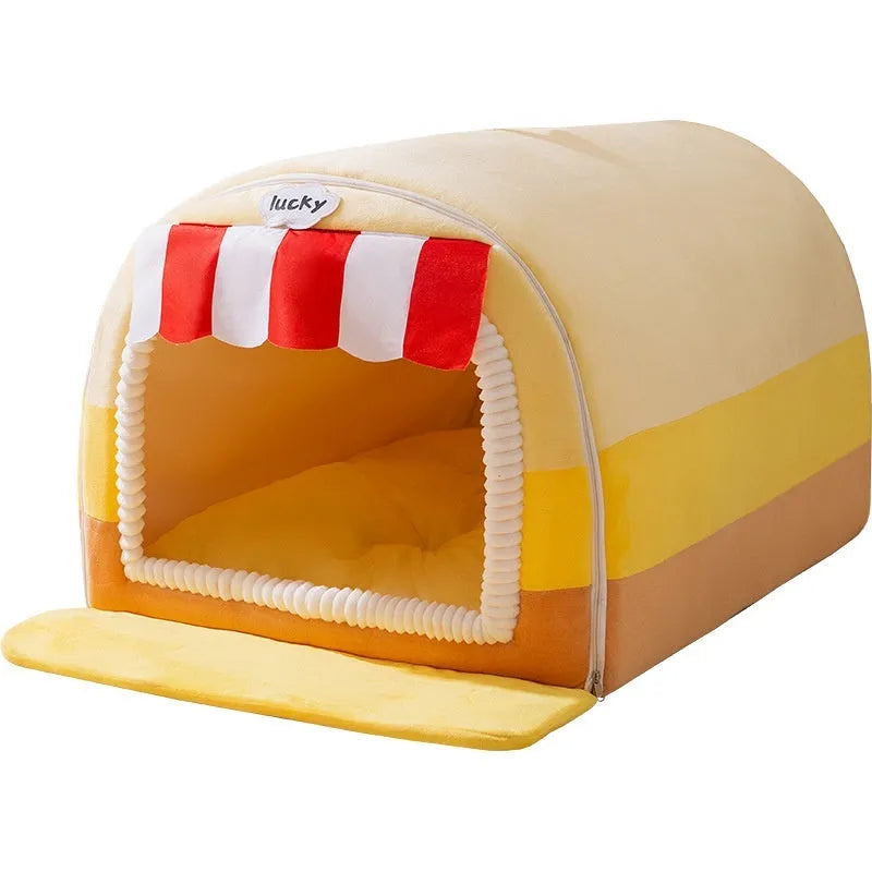 Sponge-filled dog bed with a colourful printed removable cover, shown in multiple size options for large dogs.