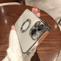 Electroplated silicone iPhone case with integrated camera lens protector shown in transparent finish
