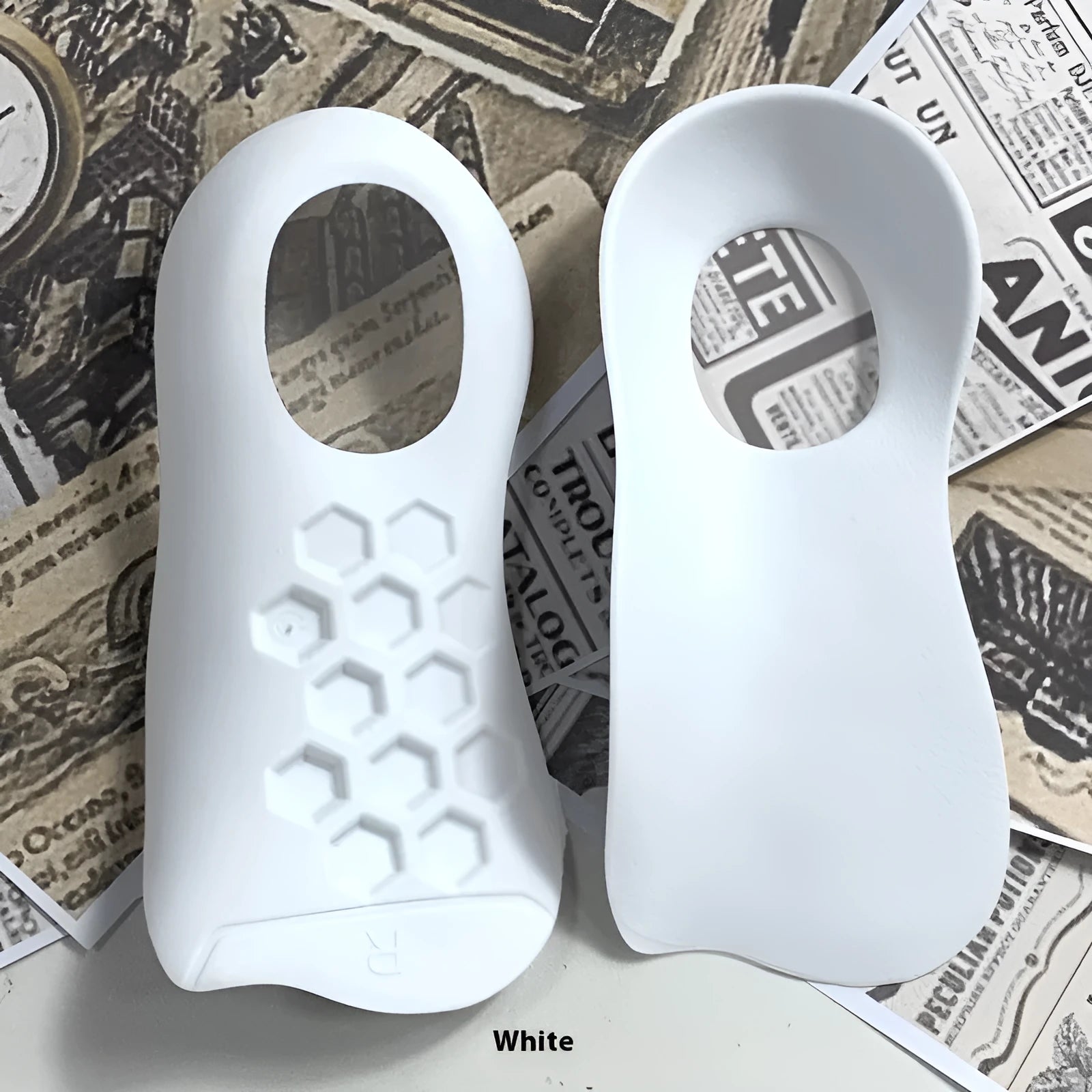 Pair of white TPR arch support varus correction insoles for shoe sizes 35-45