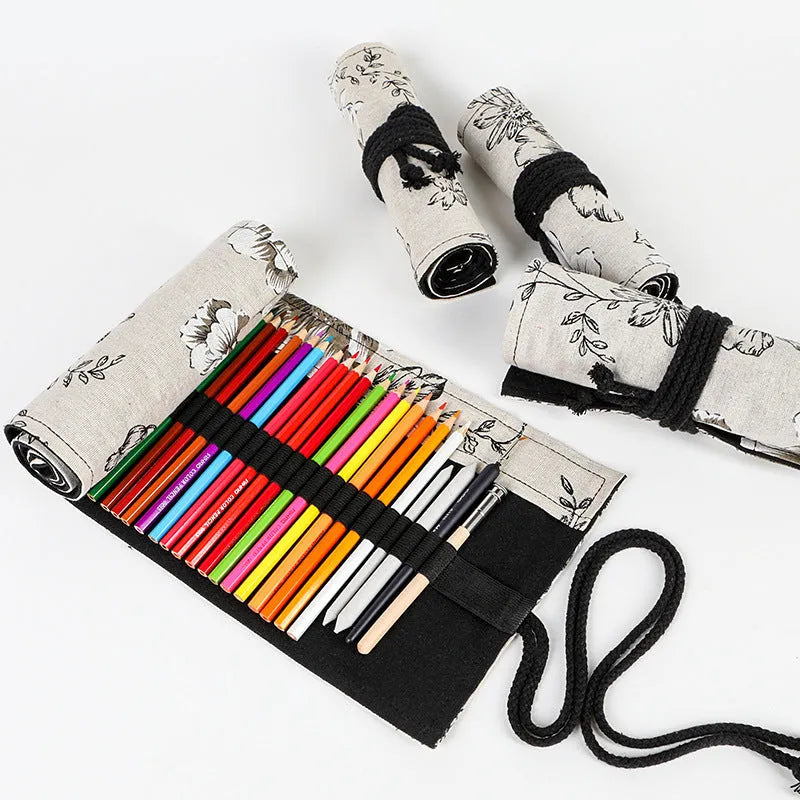 Square canvas pencil roll bag with black peony print design showing pencil pockets