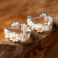 White daisy flower ring earrings with electroplated platinum finish and copper construction