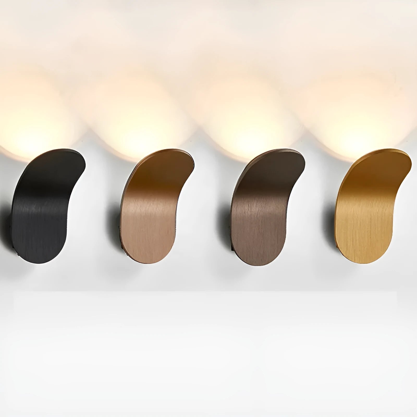 Modern brushed metal wall lamp in gold finish with contemporary design for accent lighting