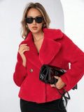 Women's loose short faux fur coat in rose red, showing regular sleeves and a textured fabric.