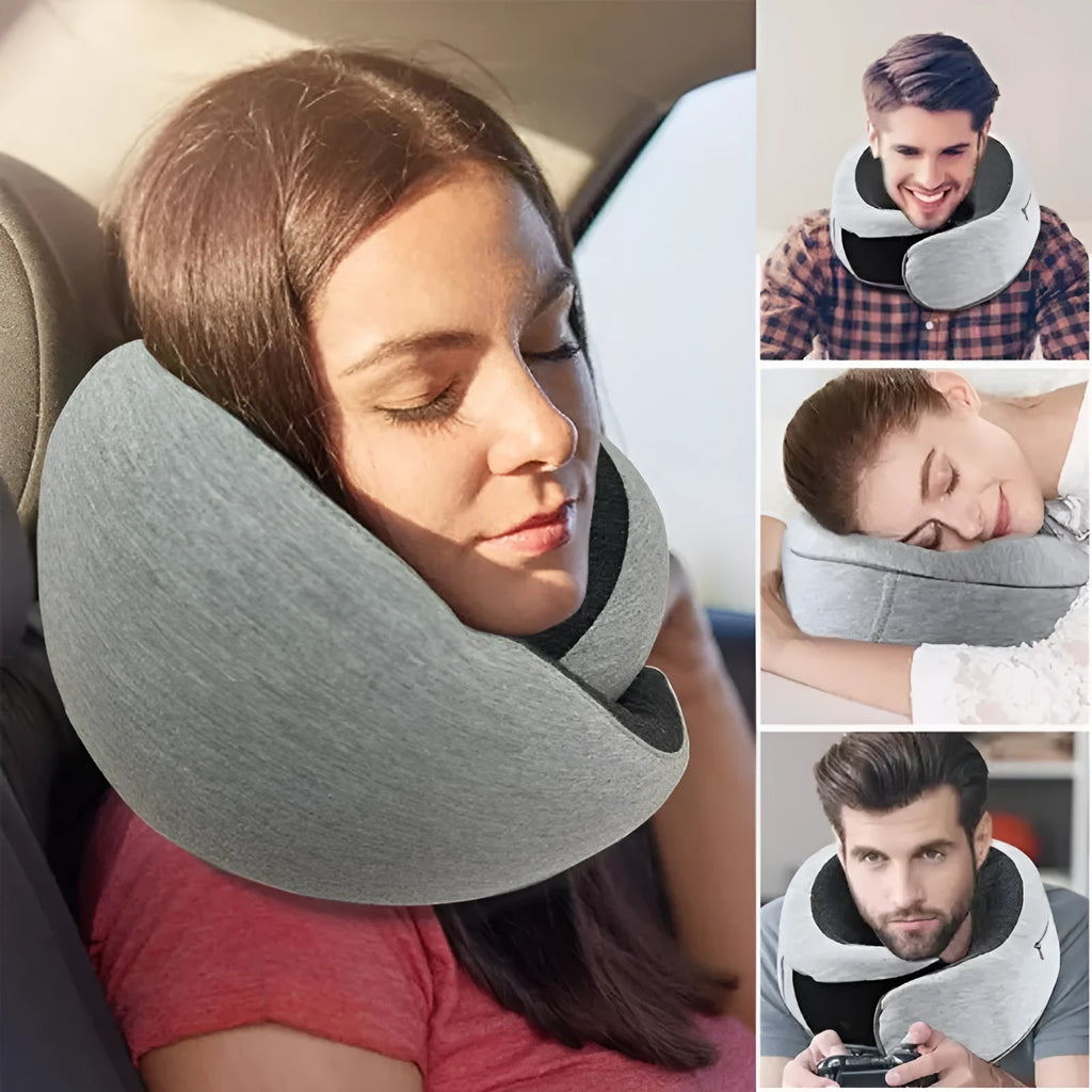 U-shaped navy blue travel neck pillow with memory foam, shown rolled up next to its carry bag.