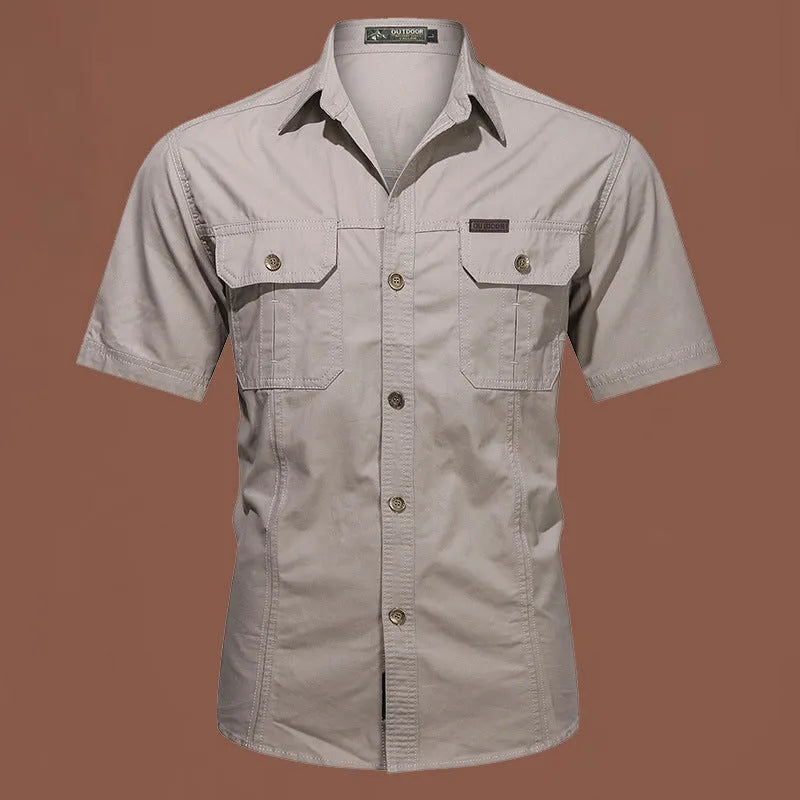 Men's short sleeve cotton shirt in army green colour, showing loose fit and cardigan style on a hanger.