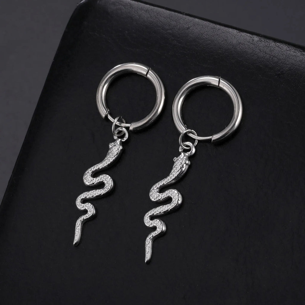 A pair of vintage-style snake-shaped earrings in stainless steel with a gold or steel electroplated finish.
